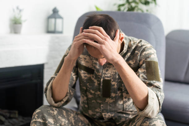 istock a military man at a psychologist, PTSD 1451465758
