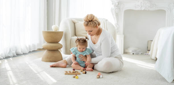 istock Developing exercise toy game for baby toddler. Child learning shape and color. Tactile experience 1451465889