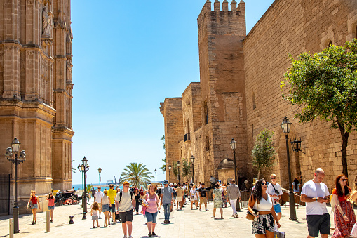PALMA, MALLORCA, Spain - JUL 09, 2022. Tourists visiting the cathedral of the Holy Mary in Palma de Mallorca, also called La Seu (Catalan Episcopal See), is the Episcopal Church of the Diocese of Mallorca. Balearic Islands.