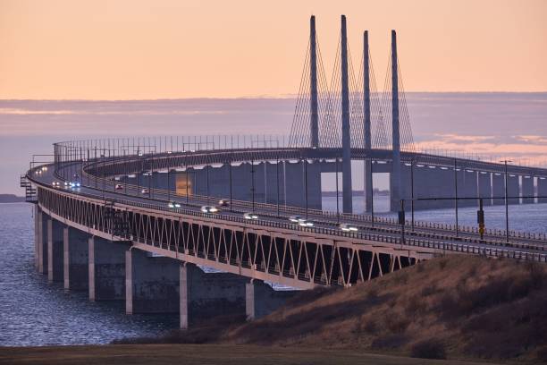 Beautiful view of the Oresund bridge at sunset in Sweden A beautiful view of the Oresund bridge at sunset in Sweden oresund bridge stock pictures, royalty-free photos & images