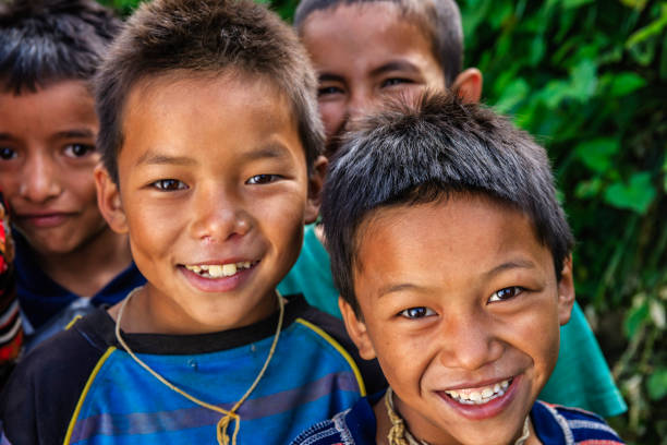 istock Happy Nepali boys near Annapurna Range 1451473053