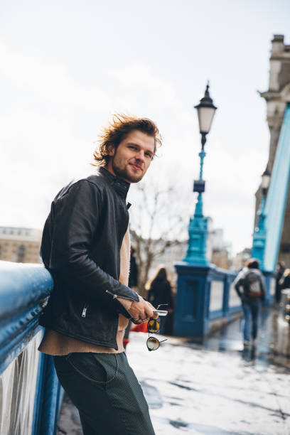 istock Young man in London city streets 1451480629