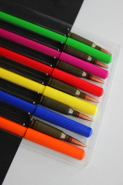 istock Colored Art Marker Pens And Bullets In One Plastic Tray On A Black And White Surface 1451482644