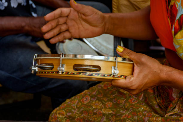 istock Percussionist hands playing tambourine during brazilian carnival 1451482809