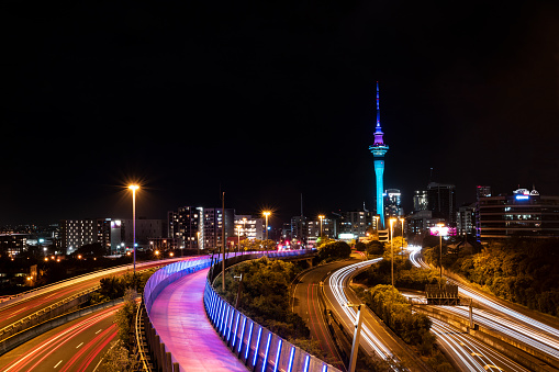 Long exposure image of Auckland City traffic on a highway at night, New Zealand