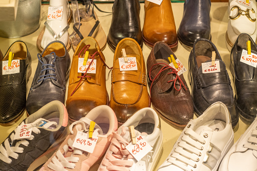 Shoe Shop at Florence in Tuscany, Italy, with commercial labels visible.
