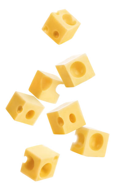 istock Flying delicious cheese cubes on white 1451488644