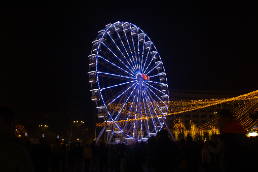 Ferris wheel at night at Bucharest Christmas Market