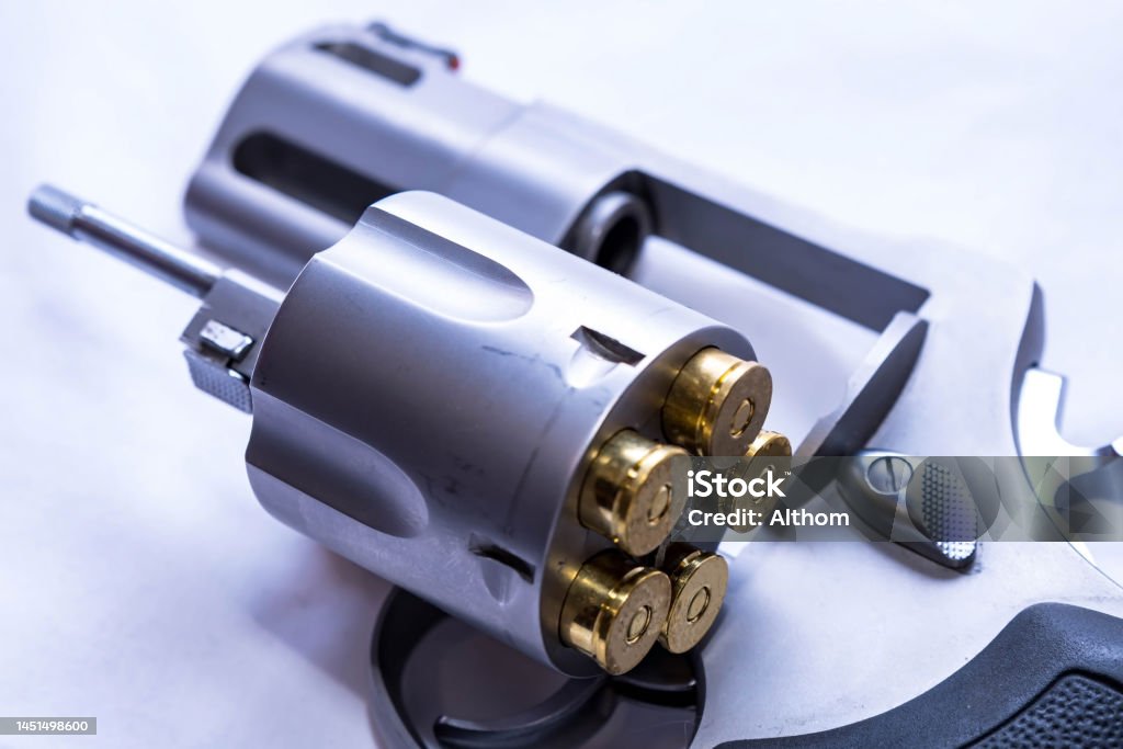 A 454 Casull Revolver With An Opened Loaded Cylinder Stock Photo a-454-casull-revolver-with-an-opened-loaded-cylinder-stock-photo