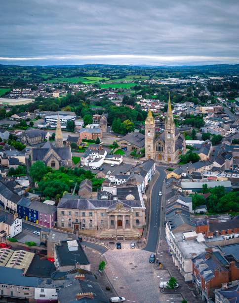 istock Aerial view of cityscape Omagh surrounded by dense trees 1451501058