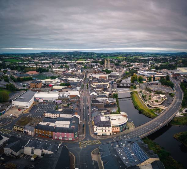 istock Aerial view of cityscape Omagh surrounded by dense trees 1451501061