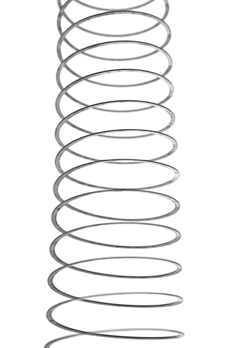 Metal Slinky Stretched out on a White Background