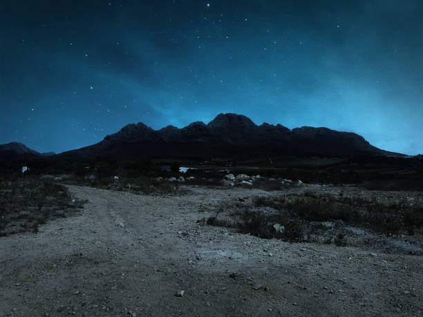 Mountains in the distance with a starry view