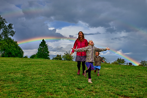 Late summer day with stormy weather creates double rainbow. Part of happy moments outdoor series.