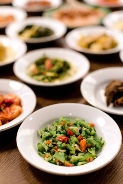 stir fried bitter gourd on dish. indonesia food