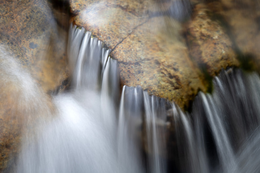 Water flowing over rocks at Blue Ridge Falls, North Hudson, New York, USA