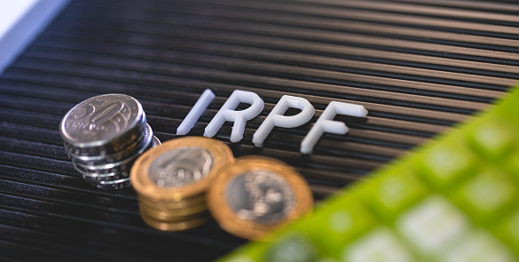 The initials IRPF in a frame with letters referring to the Individual Income Tax in Brazil. Brazilian Portuguese language.