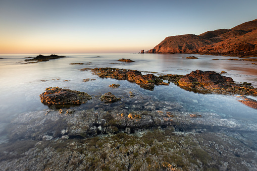 Sunrise on the coast of Escullos. Natural Park of Cabo de Gata. Almeria. Spain.