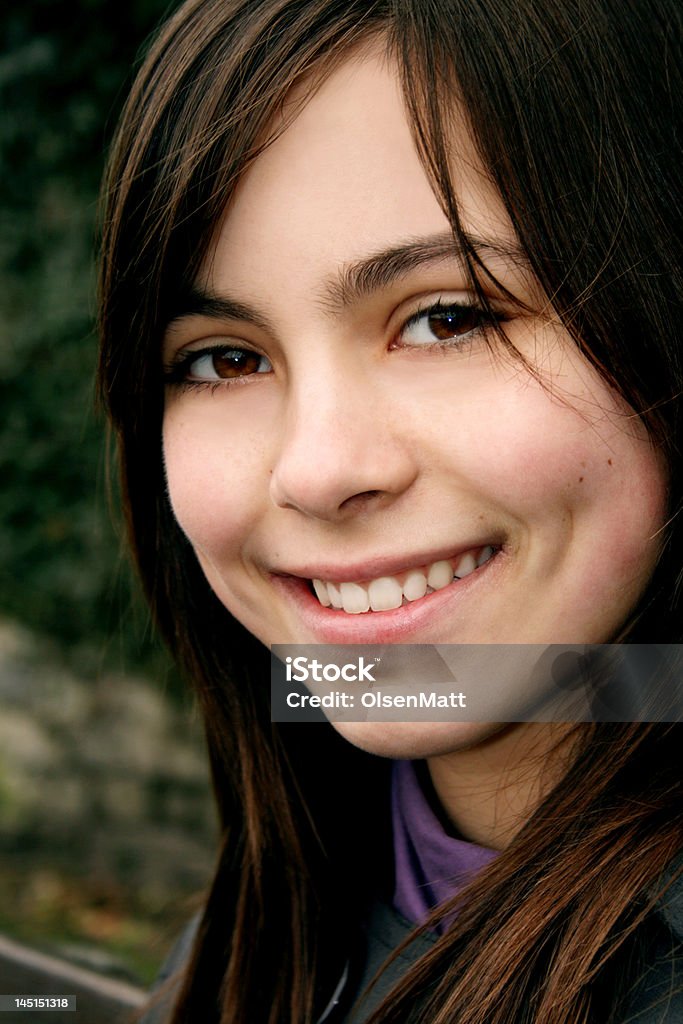 Young Smiling Girl Portrait of a young smiling girl. 14-15 Years Stock Photo