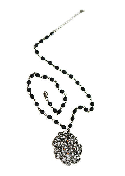 istock Black necklace isolated on white 145151335