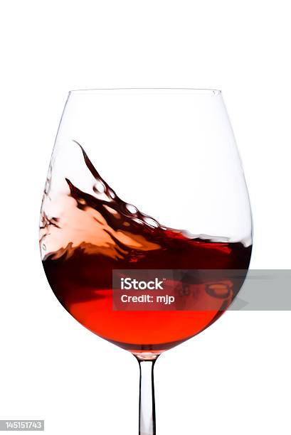 A Swishing Glass Of Red Wine On A White Background Stock Photo - Download Image Now - Alcohol - Drink, Anniversary, Blank