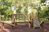 Wooden modern ecological safety children outdoor playground equipment in public park.