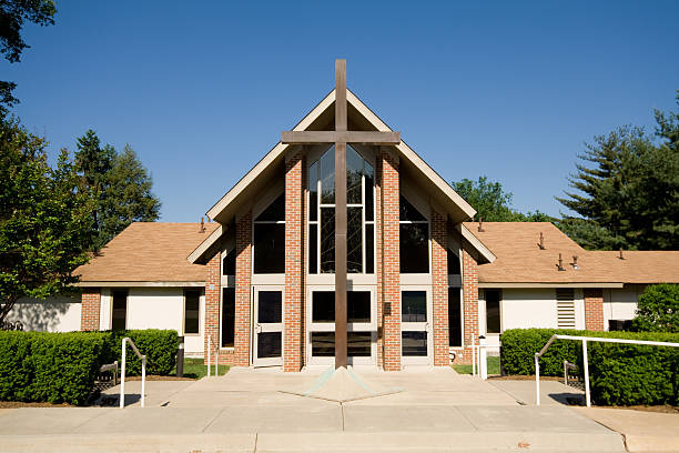 Exterior of Modern Church with Large Cross stock photo
