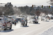 Vehicle exhaust pollution fumes rise in air Lakewood Colorado winter