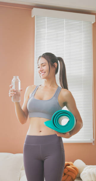 istock woman doing yoga 1451528633