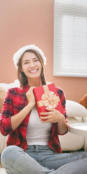 istock woman and gift 1451532293