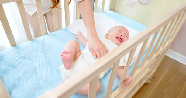 istock mother comfort crying baby 1451532809