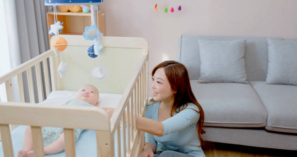 istock Cute newborn baby in crib 1451533078