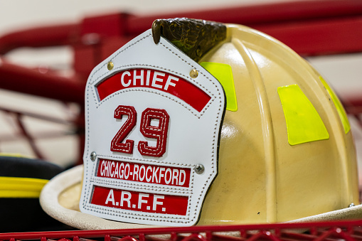 Rockford, IL USA - December 21, 2022: Chief fire fighter's helmet at the Rockford International Airport Fire Department.