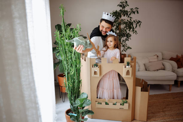 istock Father Playing Exciting Adventure Game With Daughter 1451538952
