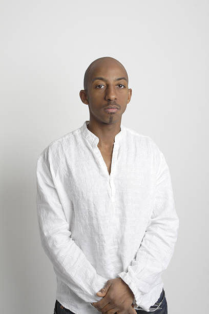 istock Serious Black African American Man White Linen Shirt 145154014