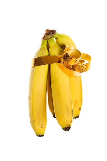 Sheaf de bananas na embalagem de oferta - fotografia de stock