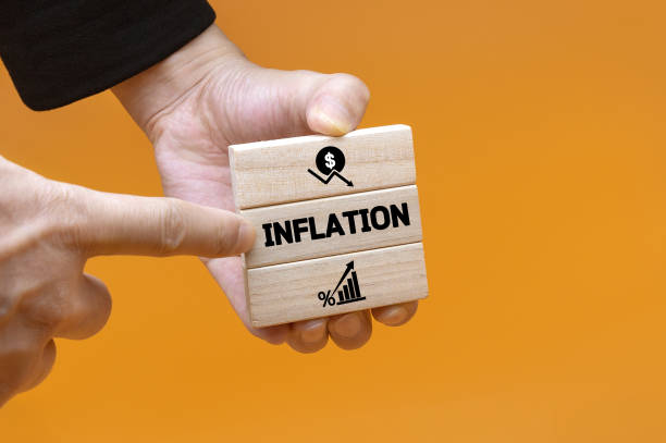 istock Inflation and Symbols on Wooden Blocks 1451543822