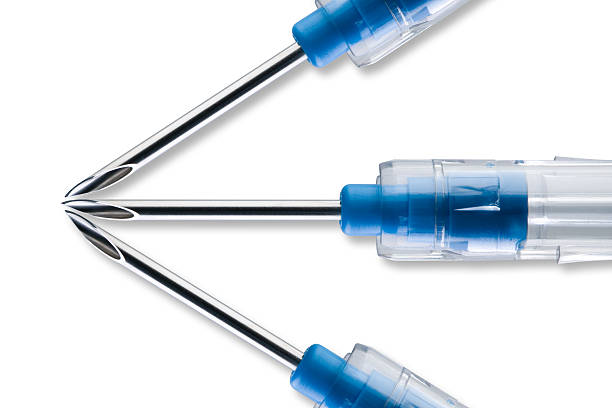 3d Syringe needles pointing to the left stock photo