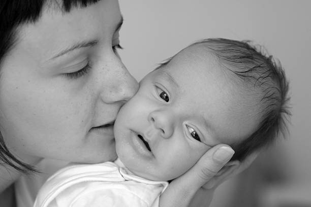 istock Mother and small newborn 145155026