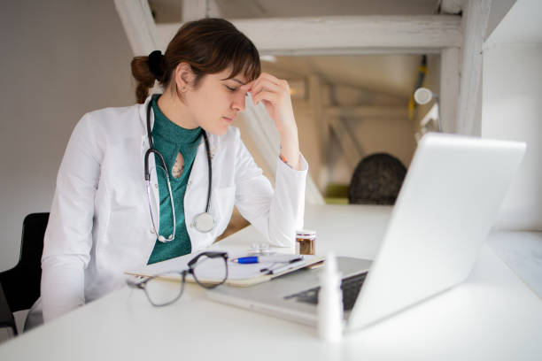istock Young doctor on a video call with a patient 1451558277
