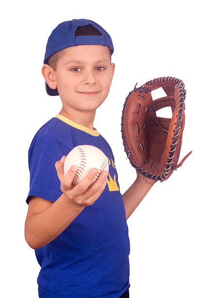istock Young boy holding ball and mitt 145156450