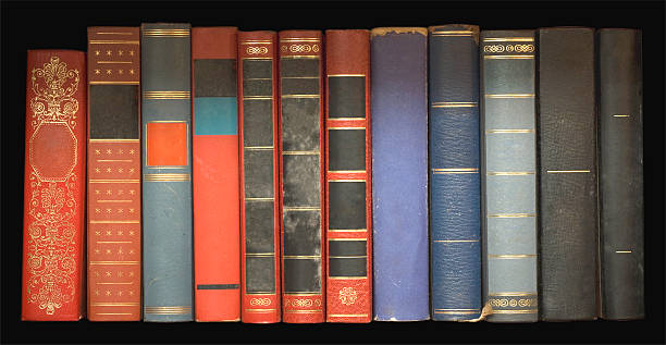 Set of antique books resting on a shelf