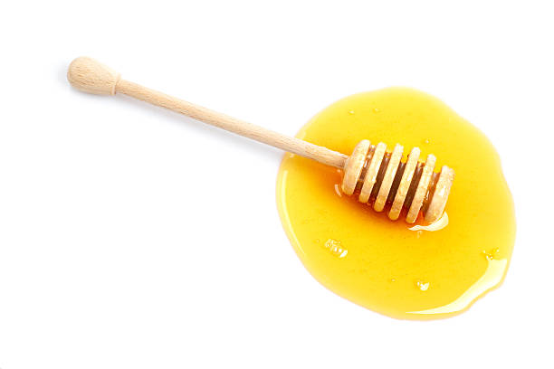 istock Honey and wooden drizzler 145156777