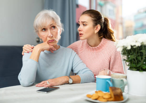 istock Girl asking for forgiveness from offended mother at home table 1451568082