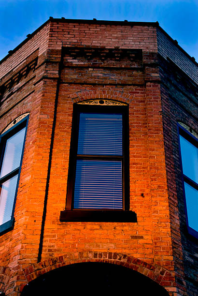 Brick Building and Window stock photo