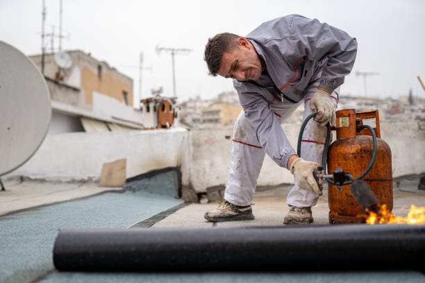 istock Flat roof covering works with roofing felt 1451576442