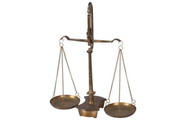 istock Bronze traditional balance scale isolated on white background. 1451588315