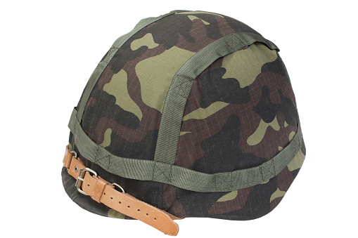soviet army steel helmet with camouflage cover isolated on a white background