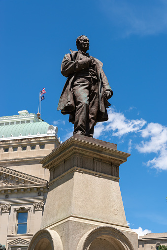 Indianapolis, Indiana - United States - July 29th, 2022: The Thomas A. Hendricks Monument, built in 1890 by artist Richard Henry Park, at the Indiana State Capitol Building.