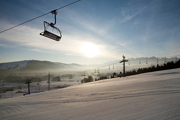 istock Ski lifts early morning 145159664